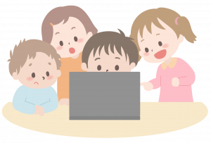 パソコンを見つめる子供たち